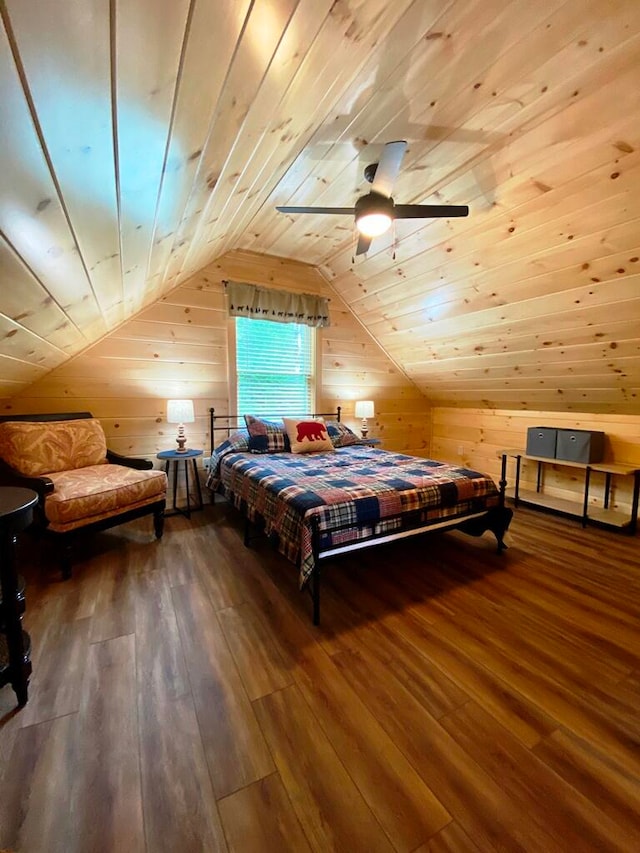 bedroom with dark hardwood / wood-style flooring, lofted ceiling, wood walls, and wooden ceiling