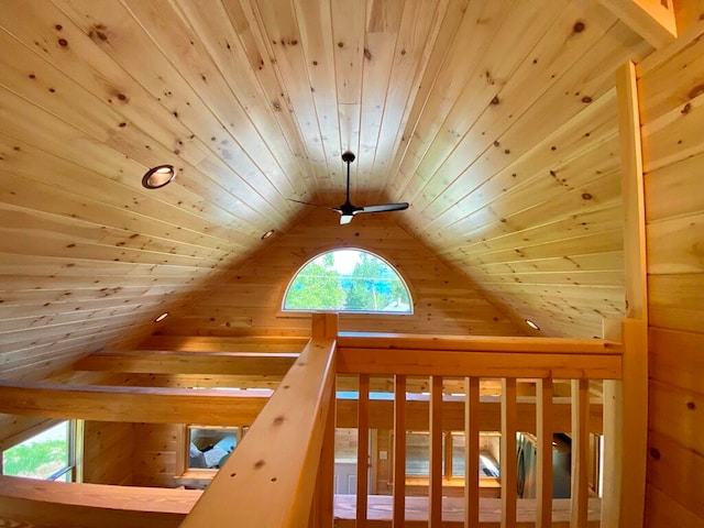 additional living space with ceiling fan, wood ceiling, vaulted ceiling, and a healthy amount of sunlight