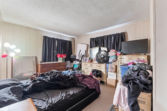 carpeted bedroom with a textured ceiling