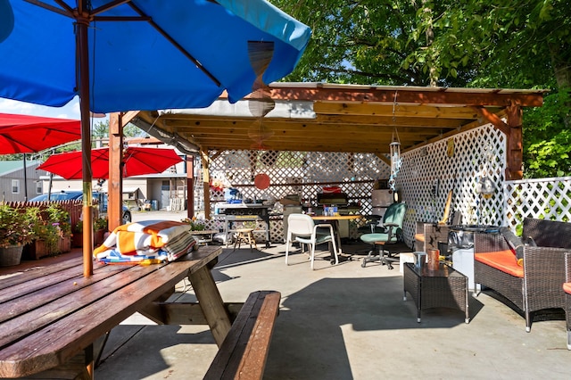 view of patio / terrace featuring fence and a gazebo
