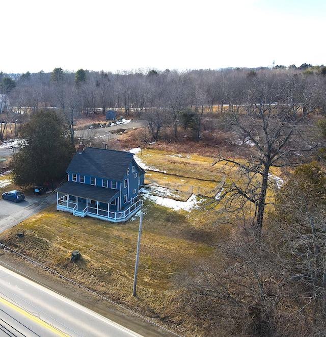 birds eye view of property featuring a rural view