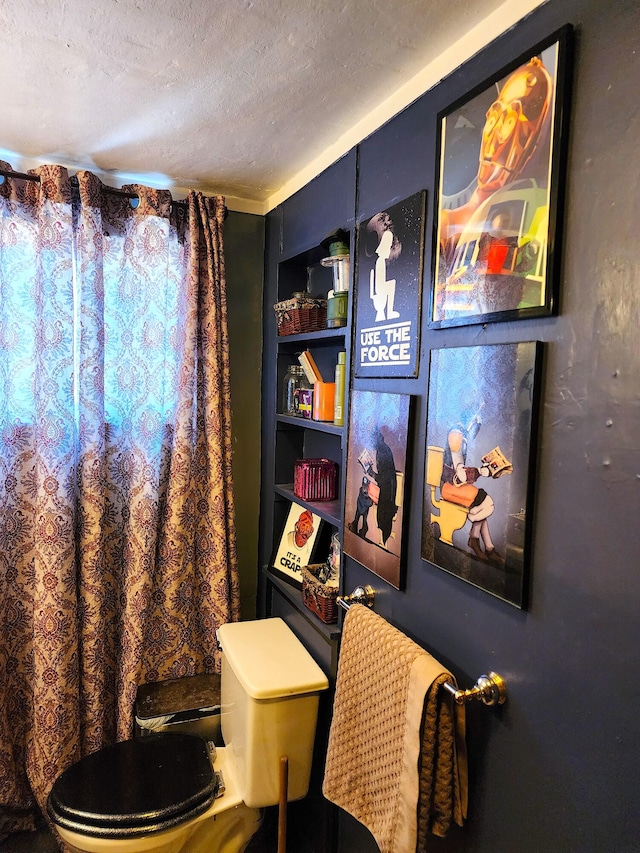 interior space featuring a textured ceiling