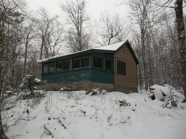 view of snow covered property