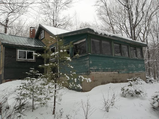 view of snow covered property