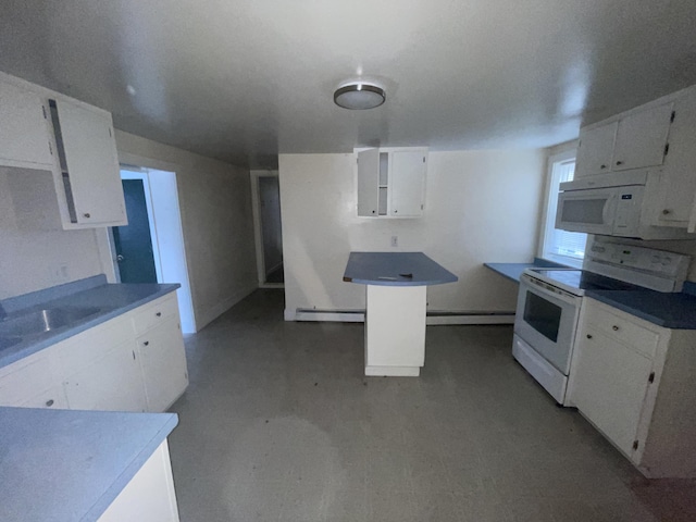 kitchen featuring white appliances, white cabinetry, and baseboard heating