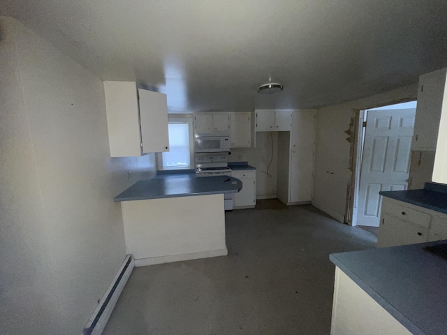 kitchen featuring white appliances, white cabinetry, and a baseboard heating unit