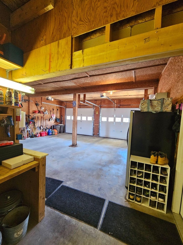 garage with a workshop area