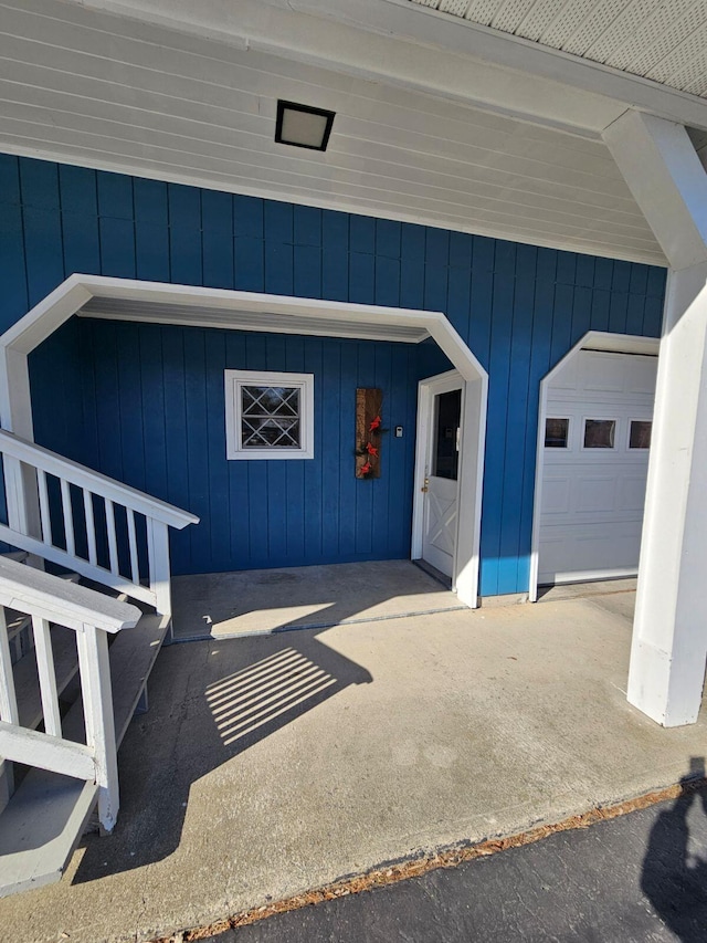 entrance to property featuring a garage