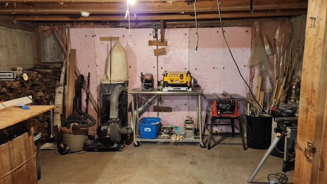 basement with a workshop area