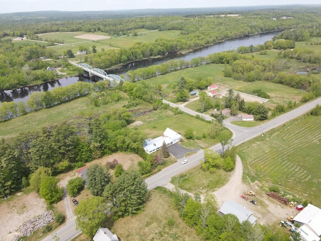 aerial view with a rural view and a water view