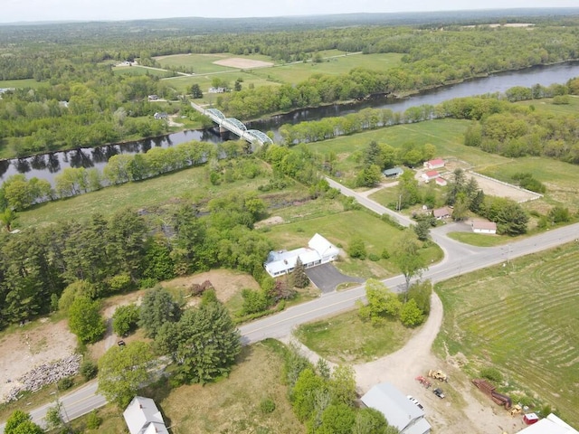 birds eye view of property with a rural view and a water view