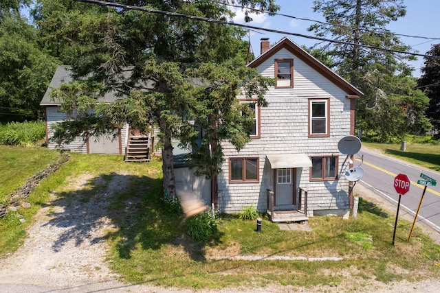 view of front of house with a front yard