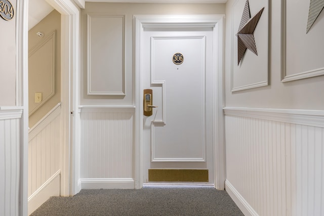 hallway featuring carpet floors