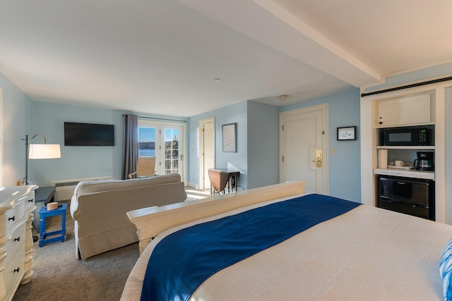 bedroom with french doors and dark colored carpet