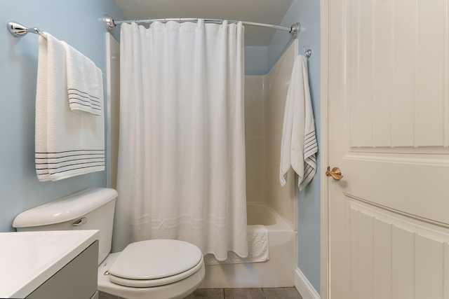 full bathroom featuring vanity, toilet, and shower / bathtub combination with curtain