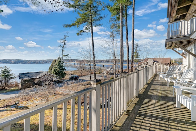 balcony featuring a water view