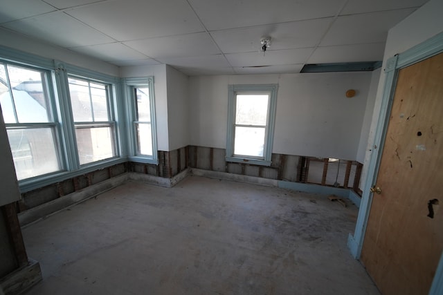 empty room with a drop ceiling