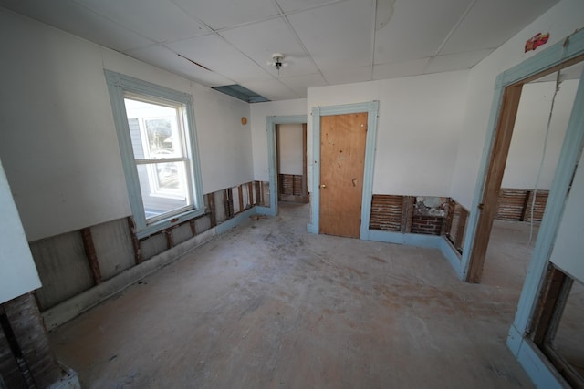 interior space featuring a paneled ceiling