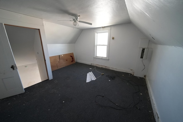 bonus room featuring ceiling fan and vaulted ceiling