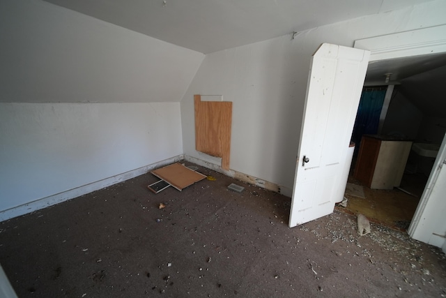 bonus room featuring vaulted ceiling