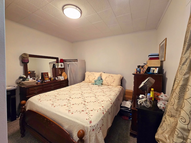 carpeted bedroom with crown molding