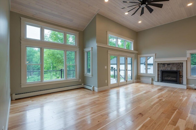 862 W Neck Rd, Nobleboro, ME 04555 - unfurnished living room with baseboard heating, high vaulted ceiling, wooden ceiling, ceiling fan, and a stone fireplace