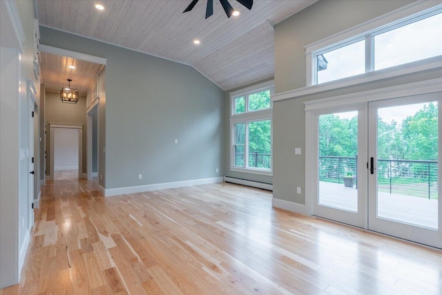 862 W Neck Rd, Nobleboro, ME 04555 - empty room with a baseboard heating unit, ceiling fan, light wood-style flooring, wood ceiling, and a chandelier