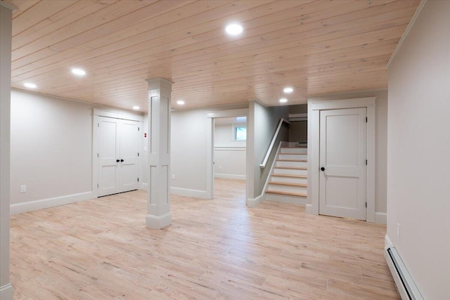 862 W Neck Rd, Nobleboro, ME 04555 - below grade area with wooden ceiling, a baseboard heating unit, recessed lighting, light wood-type flooring, and stairway