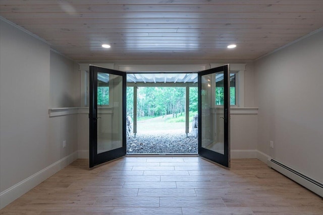 862 W Neck Rd, Nobleboro, ME 04555 - doorway to outside with a baseboard radiator, wood ceiling, light wood-style flooring, crown molding, and recessed lighting