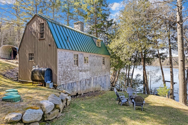 view of shed / structure featuring a yard