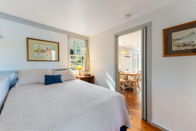 bedroom with light hardwood / wood-style floors