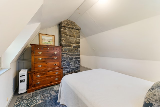 bedroom featuring vaulted ceiling