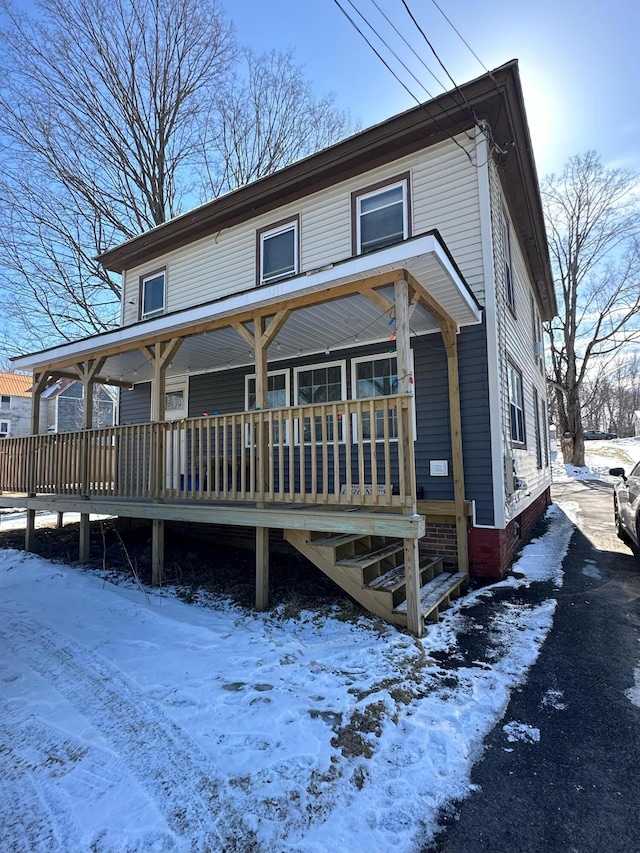 view of snow covered property