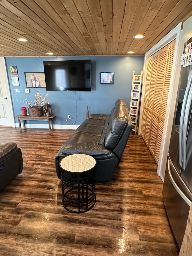 living room with dark wood-type flooring and wooden ceiling