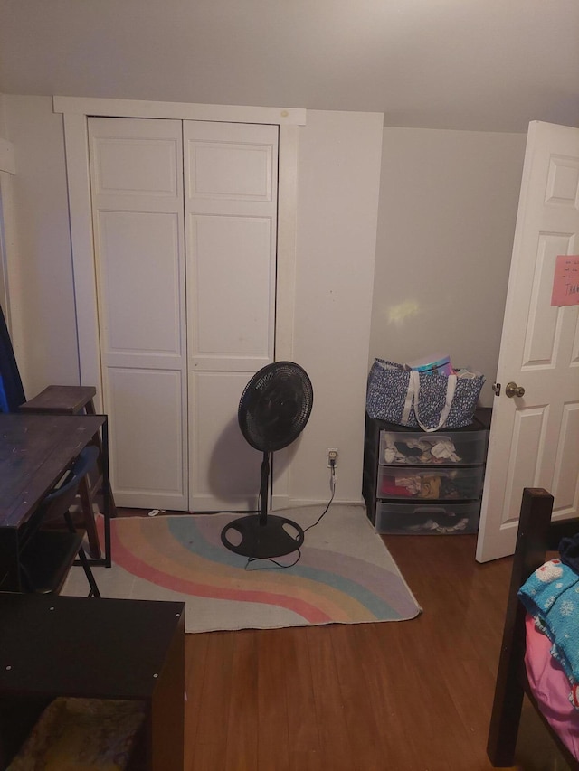 miscellaneous room featuring dark hardwood / wood-style flooring