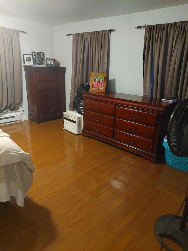 bedroom featuring wood-type flooring