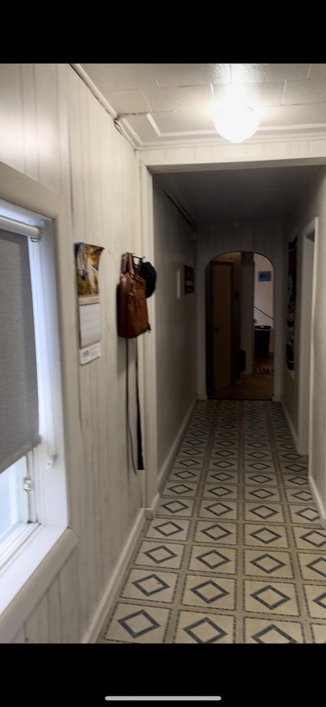 corridor featuring tile flooring