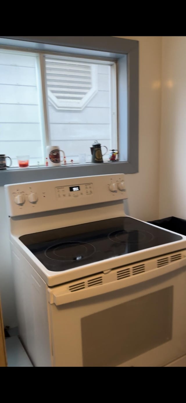 room details with white range with electric stovetop