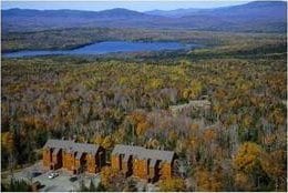 property view of mountains featuring a view of trees