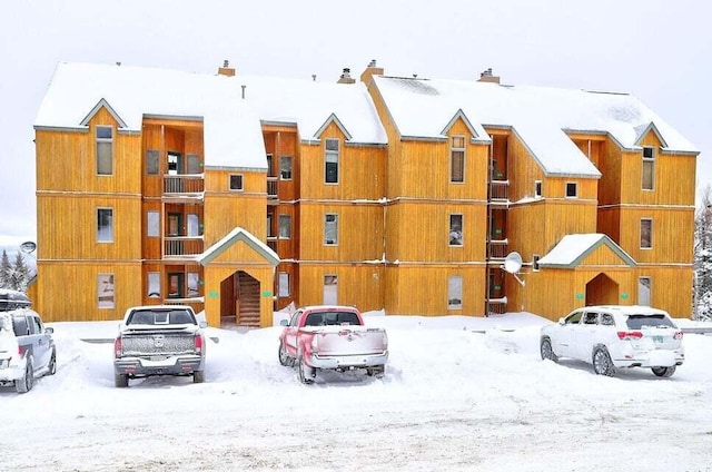 view of snow covered property