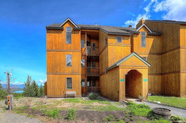 rear view of house with a balcony