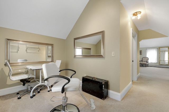 carpeted office featuring vaulted ceiling and a baseboard radiator