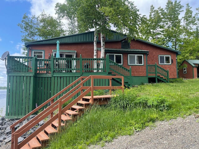 rear view of house with a deck