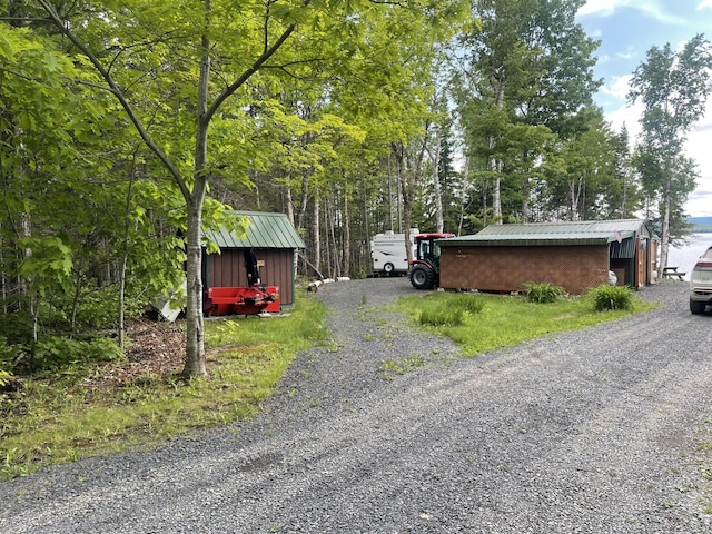 161 Burnt Lndg Unit T16 R5, Wels, ME 04779 - view of front of property featuring an outdoor structure