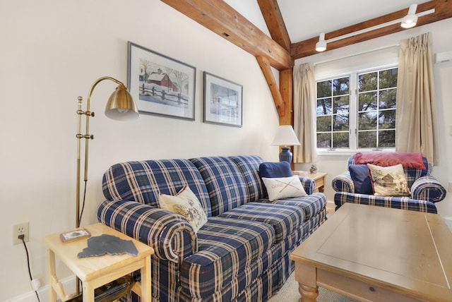 living room featuring beam ceiling