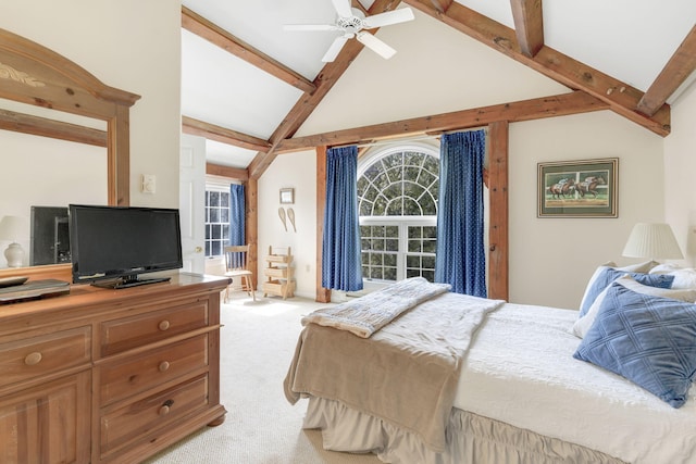 bedroom featuring ceiling fan, lofted ceiling with beams, and light carpet