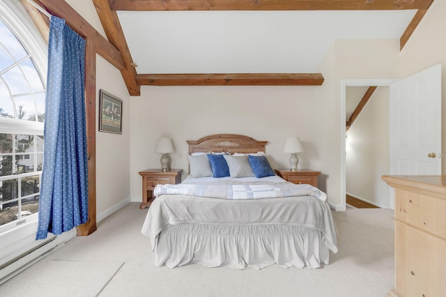 bedroom featuring lofted ceiling with beams, light colored carpet, and multiple windows