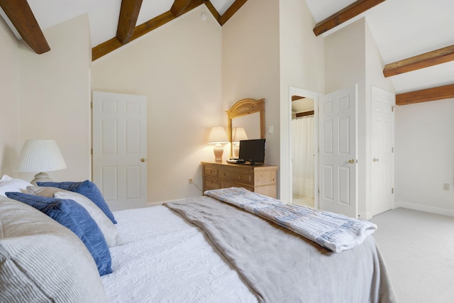 carpeted bedroom featuring high vaulted ceiling and beamed ceiling