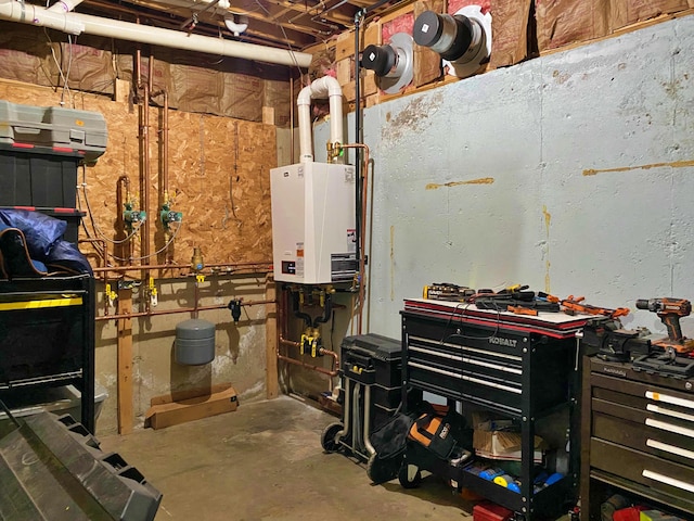 interior space featuring a workshop area and tankless water heater