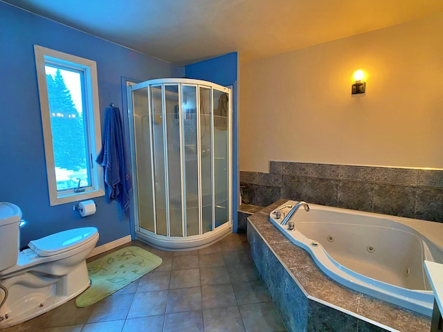 bathroom with a healthy amount of sunlight, independent shower and bath, toilet, and tile floors